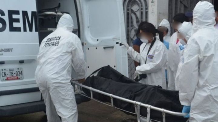 Autoridades encuentran restos humanos semienterrados en un lote baldío