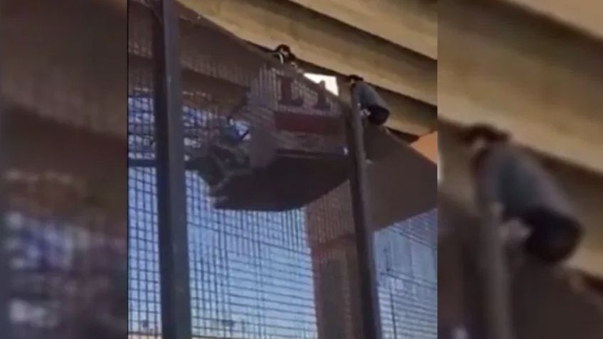 VIDEO: Mujer embarazada queda atrapada al intentar cruzar el muro fronterizo con EU