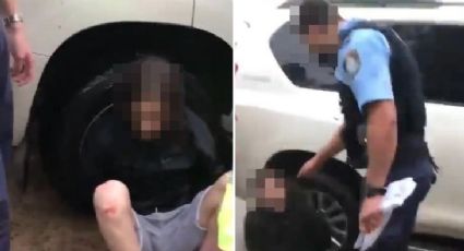 (FOTO) "Deja de golpearlo": Madre desperada suplica a policías suelten a su hijo con problemas mentales