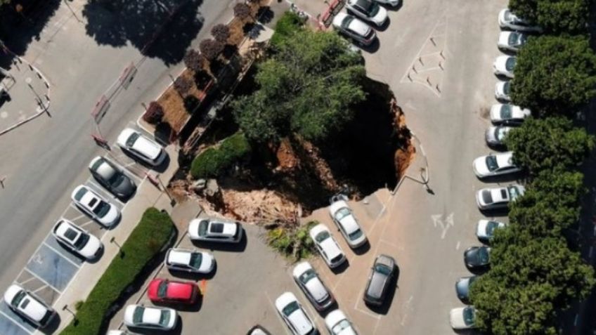 VIDEO: Un impactante socavón se 'traga' autos en estacionamiento de hospital en Jerusalén