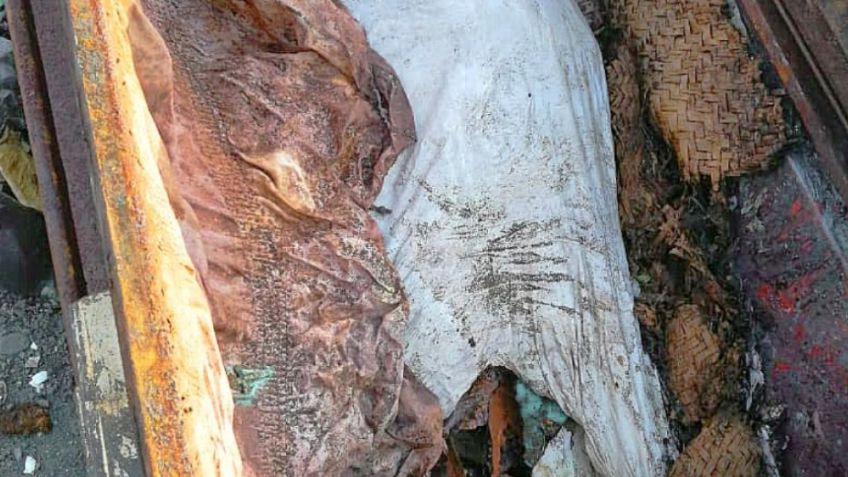 Abandonan en el basurero un cuerpo putrefacto dentro de un féretro; policías investigan