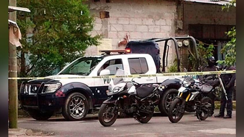 En presencia de su hijo, sicarios ejecuta a tiros a un hombre y hieren al menor