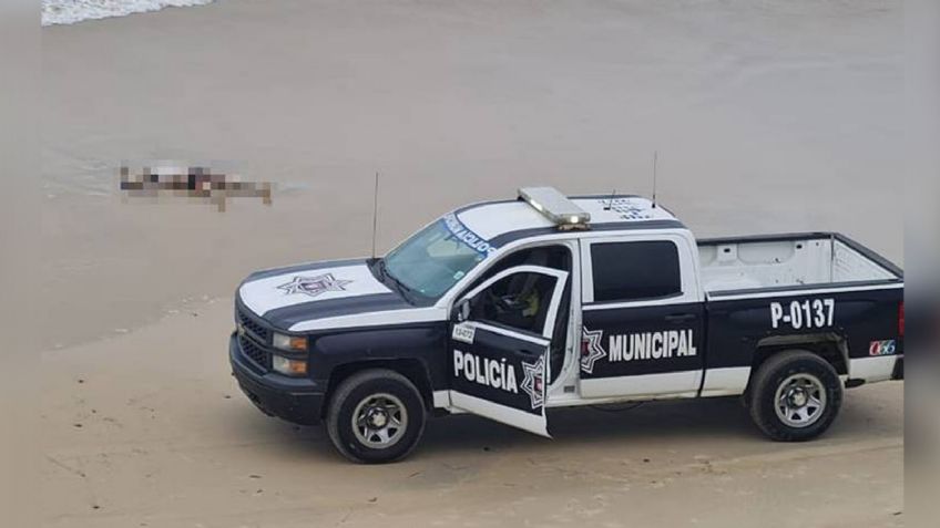 A la orilla de Playas de Tijuana, encuentran el cuerpo de un hombre tendido