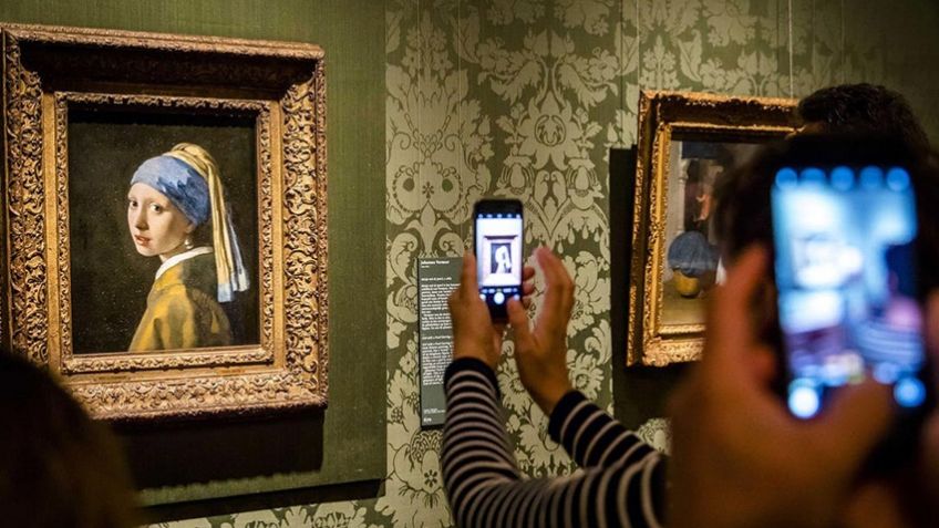 (VIDEO) Cambio climático: Activistas lanzan salsa de tomate a 'La joven de la perla', de Vermeer