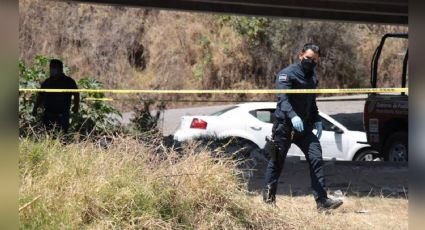 Localizan dos cuerpos 'embolsados' debajo de un puente; les colocaron un 'narcomensaje'