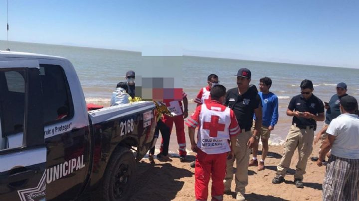 Rescatan a tres menores de edad en playa de Sonora; fueron sorprendidos por la marea alta