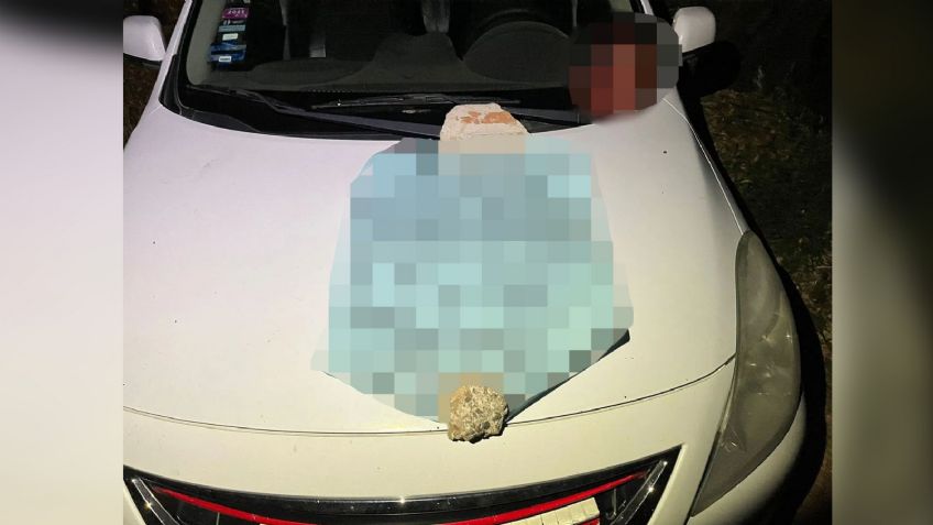 Horror en Michoacán: Sobre el cofre de un taxi, abandonan cabeza humana con 'narcomensaje'