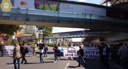 Extrabajadores de Mexicana de Aviación protestan en el Aeropuerto de la Ciudad de México