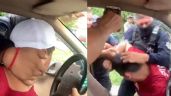 VIDEO: Grupo de Policías sacan a la fuerza a hombre de su camioneta y lo someten entre 3