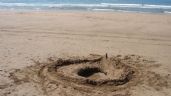 Un agujero en la arena se traga misteriosamente a un joven en la playa; esto sucedió