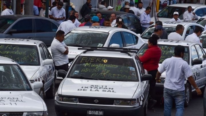 Edomex: Taxistas niegan ser "halcones" de La Familia Michoacana e impiden paso del ejército