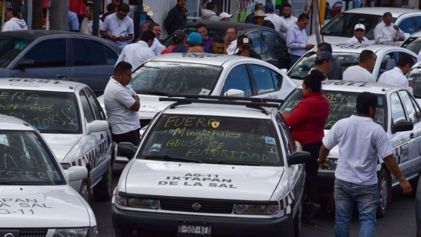 Edomex: Taxistas niegan ser "halcones" de La Familia Michoacana e impiden paso del ejército