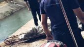 Foto ilustrativa de la nota titulada Encuentran hombre sin vida flotando en canal de SLRC; tenía signos de violencia