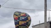Foto ilustrativa de la nota titulada VIDEO: Aterrizan de emergencia tres globos aerostáticos en Acolman y Teotihuacán