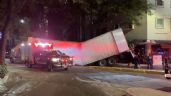 Foto ilustrativa de la nota titulada VIDEO: Fuerte incidente vial en Ejército Nacional: Se parte caja de un tráiler a la mitad