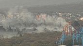Foto ilustrativa de la nota titulada Incendio en el Bosque de Tlalpan se acerca a Six Flags; bomberos lo controlan