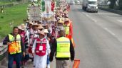 Foto ilustrativa de la nota titulada Peregrinos avanzan por la autopista México-Querétaro hacia la Basílica de Guadalupe