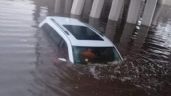 Foto ilustrativa de la nota titulada Inundación del paso desnivel deja como saldo dos vehículos varados en Navojoa