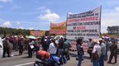 Foto ilustrativa de la nota titulada Caos en la autopista México-Puebla: Se cumplen 20 horas de bloqueo de ejidatarios