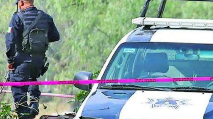 Con un balazo en la cabeza, hallan cuerpo de una mujer en un terreno baldío de Toluca