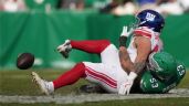 Foto ilustrativa de la nota titulada: Corredor novato de los Giants sufre escalofriante lesión y se pierde la temporada NFL
