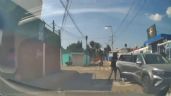 Foto ilustrativa de la nota titulada: Sicarios ejecutan VIOLENTO atraco afuera de escuela en Puebla: Someten a mujer frente a sus hijos