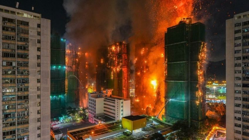 Sube a 160 el número de muertos por VORAZ INCENDIO en Hong Kong; aún buscan a desaparecidos
