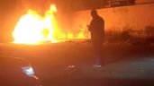 Foto ilustrativa de la nota titulada VIDEO: Sicarios abandonan cuerpos e incendian vehículo en Ciudad Azteca, en Ecatepec