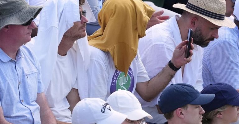Los aficionados también sufren por el calor