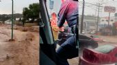Foto ilustrativa de la nota titulada VIDEO: Rescatan a familia arrastrada por la corriente; fuertes lluvias e inundaciones azotan a Nogales