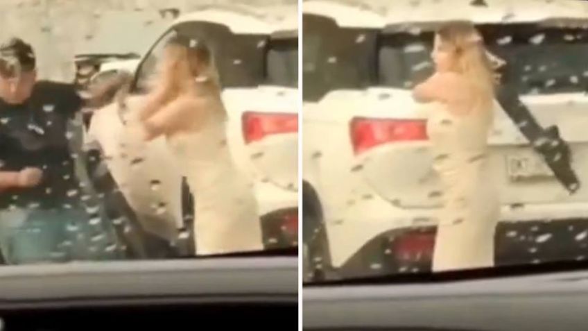 VIDEO: Captan a una mujer mientras golpea a su novio con una tabla en plena vía pública