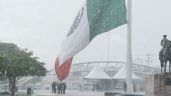 Foto ilustrativa de la nota titulada: Policías de Ciudad Obregón salvan la bandera de México en intensa lluvia