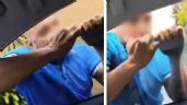 Foto ilustrativa de la nota titulada: VIDEO: Conductor arrastra a presunto ladrón aferrado a la ventana de su auto en Puebla