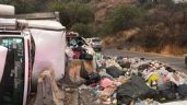 Foto ilustrativa de la nota titulada: Alerta: Tráiler con TONELADAS de basura se vuelca y provoca CAOS en Nicolás Romero, Edomex