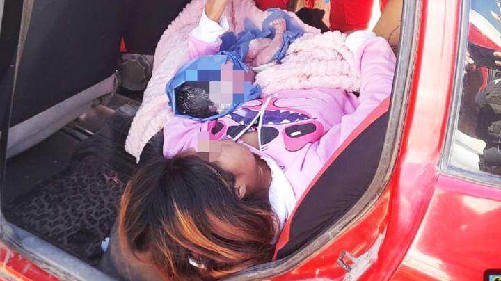 Mujer embarazada da a luz a bordo de vehículo en Providencia; policías asistieron el parto